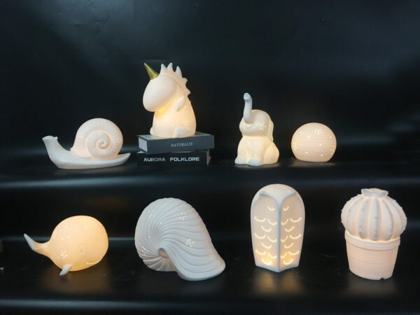 The snail/elephant/pekingese/owl/dolphin/pig/bear/cactus/shell decor with LED light